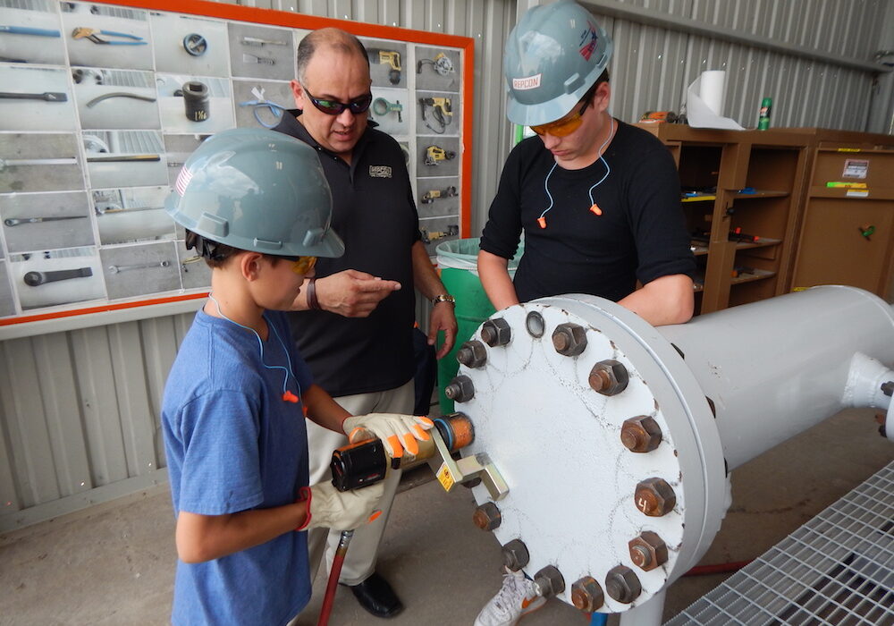 The young people involved in Hammons Education Leadership Program learn what it’s like on the job site during the final step of the Texas Three-Step program. First, they learn about the job through videos; then, they talk to someone from the job site; last, they visit the site and are put to work. Courtesy photo