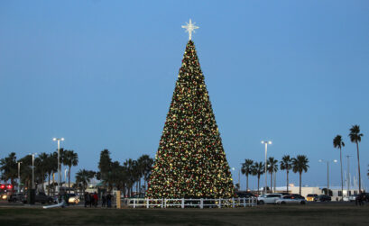 In 2018, Corpus Christi gave itself a Christmas present: a new 66-foot-tall Christmas tree with 2,000 ornaments and 7,000 lights. Although the Harbor Lights Festival centered around the tree was cancelled this year, Merry Days by the Bay is a go with new safety protocols. Photo by Carrie Robertson Meyer/Third Coast Photo