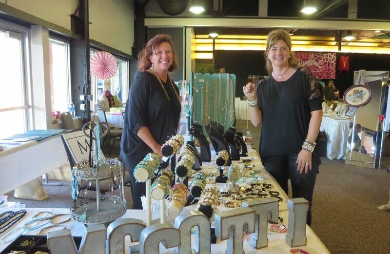 Merchants pose with their tables of goodies for sale at the 2016 YWCA Corpus Christi Yuletide Luncheon and Market. This year’s market is Nov. 2 in the Congressman Solomon P. Ortiz International Center in Corpus Christi. Courtesy photo