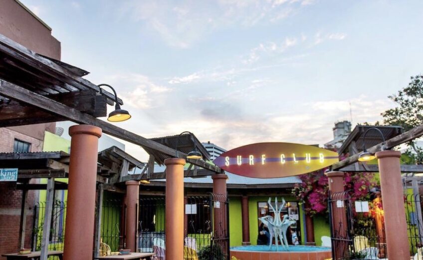 One of several entrances to the Water Street Market area in downtown Corpus Christi, home to the Executive Surf Club (shown), Water Street Oyster Bar, Water Street Sushi Room, South Texas Music Walk of Fame, and Texas Surf Museum. Courtesy image