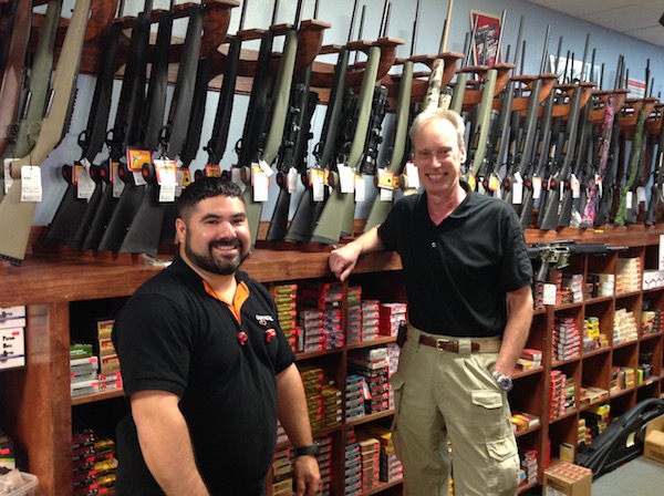 The Sharp Shooter store manager Danny Garcia (left) and owner Andy Benning in the store front at 5515 S. Staples in Corpus Christi. Besides offering an impressive inventory of guns, ammo and hunting equipment, The Sharp Shooter holds classes and has indoor rifle and handgun shooting ranges. Photo by Suzanne Freeman