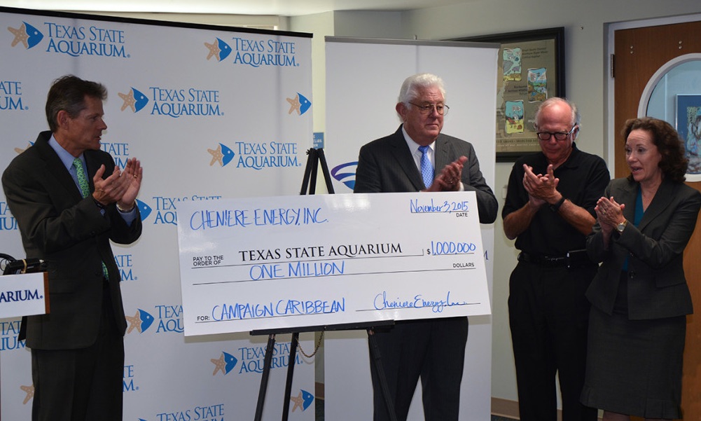 Executives from Cheniere Energy presented a symbolic giant check for $1 million to (from left) Texas State Aquarium CEO Tom Schmid, aquarium board chair Larry Urban, Rep. Todd Hunter,and Cheniere Energy VP of Government and Public Affairs Pat Outtrim during a press conference at the aquarium Nov. 3. Courtesy Photo