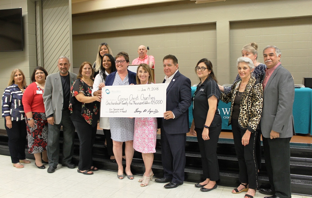 Representatives from local nonprofits, along with several members of Corpus Christi City Council, were on hand June 14 to thank representatives of WellMed Charitable Foundation for a $125,000 donation being made to their charities. Most of the money is earmarked for charities dedicated to Hurricane Harvey relief efforts. Courtesy photo