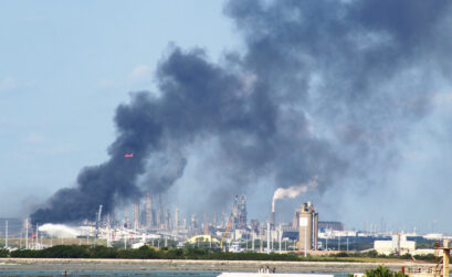 Firefighters are battling a blaze that has engulfed a barge in the Corpus Christi ship channel and involves a grain elevator. The fire is believed to be caused by the barge running into a pipeline. Photo by Carrie Robertson Meyer/Third Coast Photo