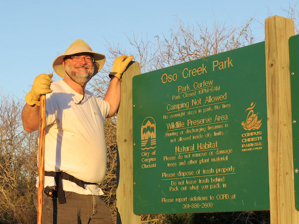 Oso Creek Park Adopt-A-Park volunteer Art Norman proudly shows off the work completed by volunteers that has made the park a vibrant addition to the community. Staff photo