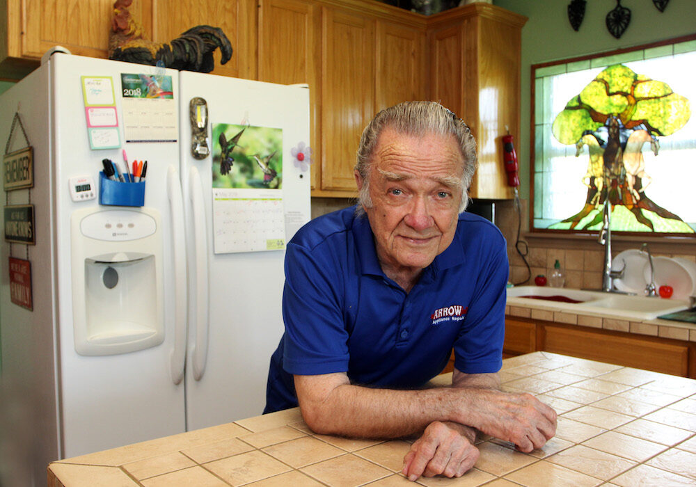 Jack English has been repairing and maintaining appliances in the Coastal Bend area for 62 years. Now both his son and granddaughter have joined him in his business, Arrow Appliance Repair Co. in Corpus Christi. Photo by Carrie Robertson Meyer/Third Coast Photo