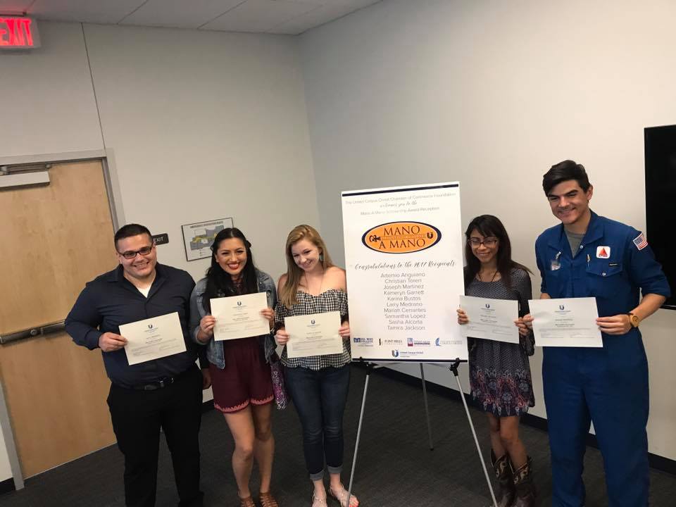 Some of the 10 students who received scholarship funds from the United Corpus Christi Chamber of Commerce’s Mano A Mano program. The awards were handed out at an event Aug. 2 in the chamber’s uptown offices. Courtesy photo