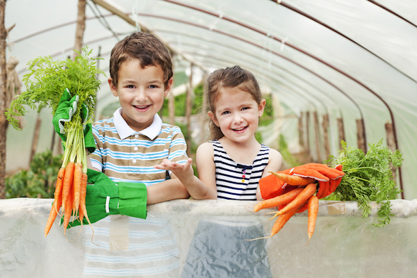 A greenhouse is a great way to get the youngsters involved — and interested — in growing their own healthy food.