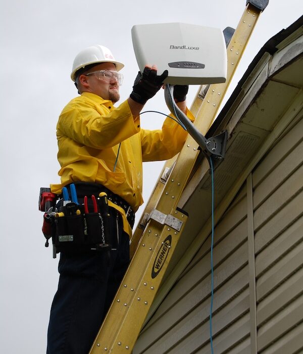 A DISH Network technician installs a ruggedized outdoor router with high-gain antennas to the roof of an area home. The new service is now available in the Coastal Bend. Courtesy Photo