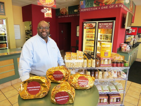 Les Pierce in his HoneyBaked Ham Cafe at 1502 Airline Drive in Corpus Christi, where customers can dine in or pick up any number of fully cooked entrees, sides or desserts for a family dinner or holiday celebration. Photo by Nickie Snow Stillman