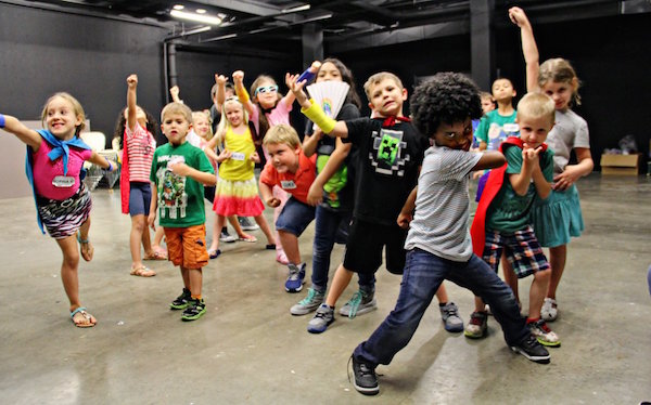 Young art lovers turned super heros take over the black box theater in the new space developed just for the young at art in the Art Museum of South Texas. Courtesy Photo