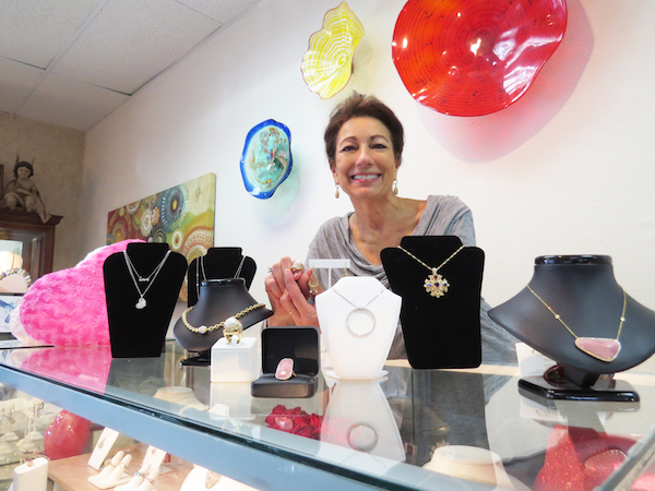 Camille Habeeb Hojnacki showcases several one-of-a-kind designer pieces as Camille’s Original Jewelry Designs in Habeeb Square gears up for Valentine’s Day. Staff photo