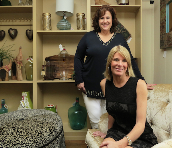 Wendi Holliday Horrell (seated) and design specialist Deborah Strauss on the showroom floor at Linda’s Drapery & Interiors, 1021 Airline Road in Corpus Christi. Staff Photo