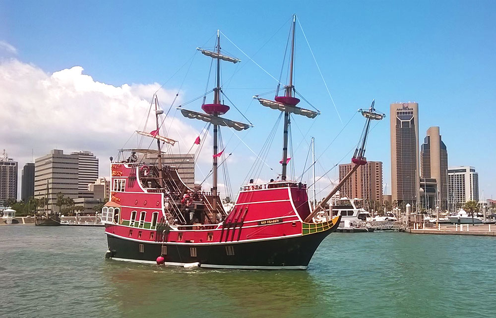 The Red Dragon is 17th century pirate ship above the water line, but a modern technological wonder below deck with the ability to turn on a dime and maneuver any challenge on the seas. Here the ship is shown in Corpus Christi, which it sails to each year for Buc Days when the Mayor walks the plank. Public cruises sail out of Port Aransas. Courtesy photo