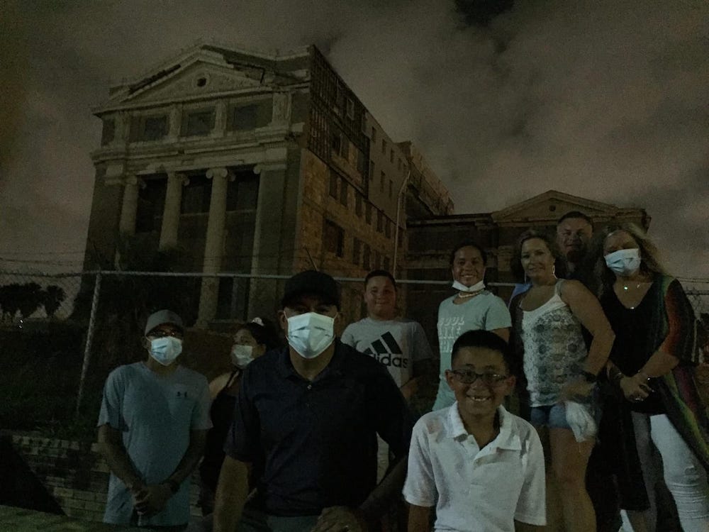 A tour group on the perimeter of the old Nueces County Courthouse in downtown Corpus Christi. Courtesy photo