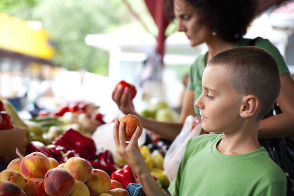 Before choosing a neighborhood, do a little research to see what kind of amenities are close by. A farmers' market, grocery stores and parks are top points of consideration.