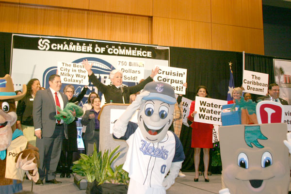 The grand finale of the State of the City speech by Corpus Christi Mayor Nelda Martinez at the American Bank Center Feb. 5 included (front) @PoccaPort's Pocca the Pelican, Hooks baseball team mascot Rusty Hook and HEBuddy, not to mention the dancing dignitaries. Staff photo