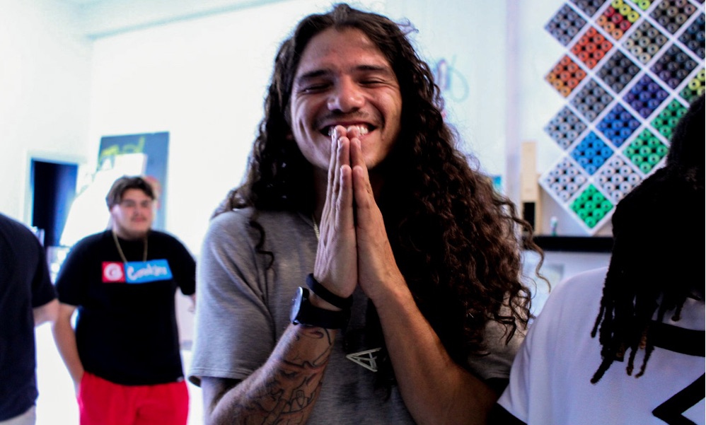 Muralist Jeremy Flores at the grand opening of Cre8ive Culture, a center for aspiring and emerging artists alike. Courtesy photo