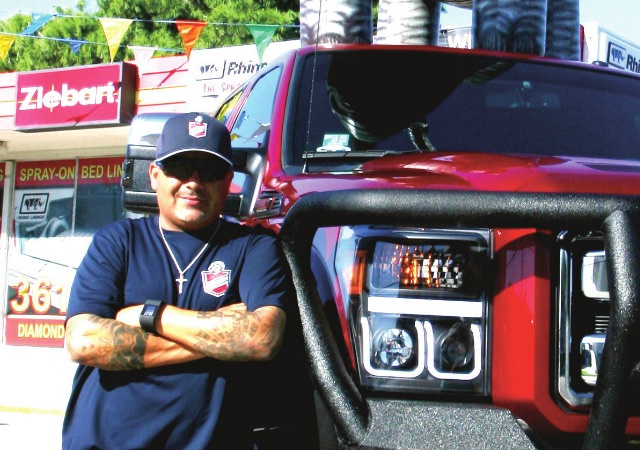 Ziebart owner Rick Saenz is proud of his tricked-out Ford truck. It’s been fully ‘Ziebart-ed,’ he said. He’s also proud to be the only Rhino Bed Lining dealer in the Coastal Bend. Photo by Carrie Robertson Meyer