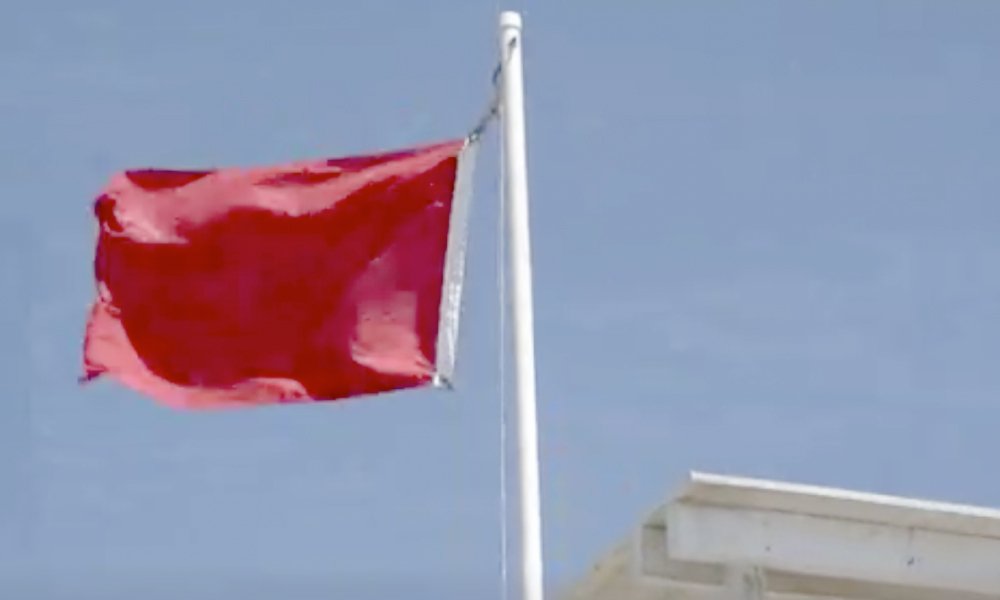 Red flags on the Corpus Christi beaches warns of high surf, dangerous currents, or both. Red flags will be posted Saturday-Sunday, Aug. 20-22. Courtesy photo.