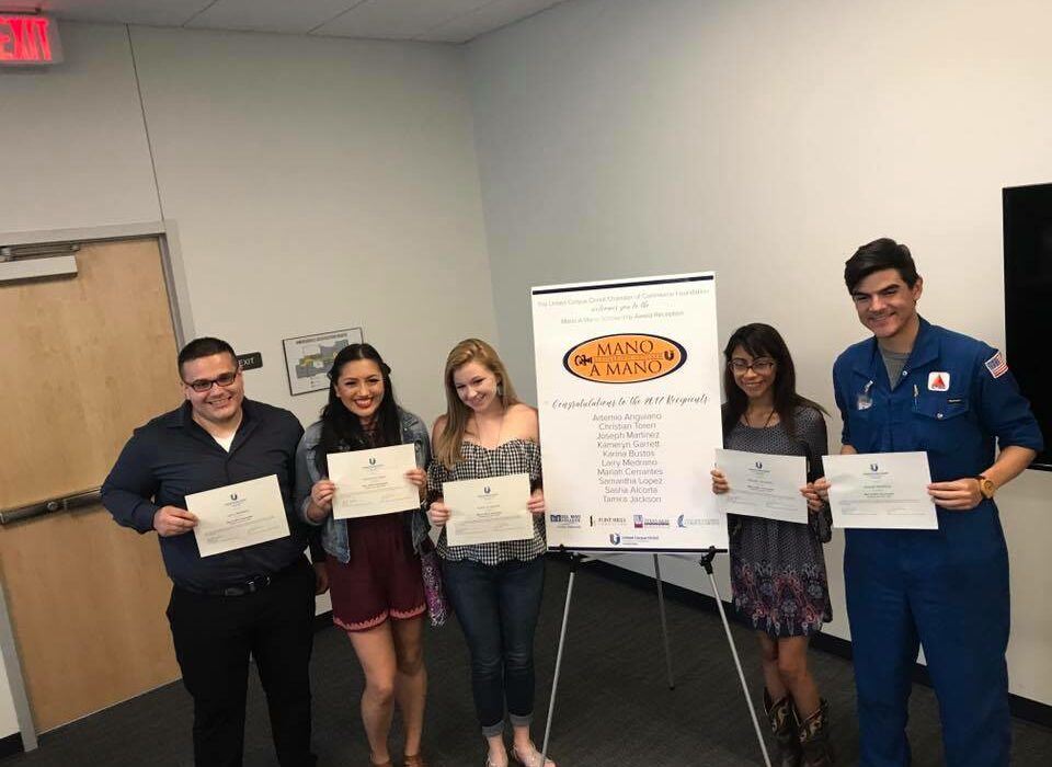 Some of the 10 students who received scholarship funds from the United Corpus Christi Chamber of Commerce’s Mano A Mano program. The awards were handed out at an event Aug. 2 in the chamber’s uptown offices. Courtesy photo